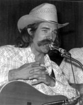 Singer Steve Cormier performing at the 1974 Florida Folk Festival - White Springs, Florida