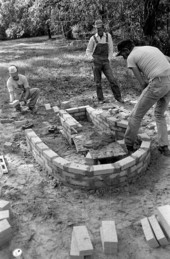 Terry Hill, Horace Temples, and Ted Temples constructing cane furnace at the Stephen Foster State Folk Culture Center - White Springs, Florida.