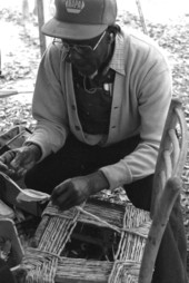 Rufus Adams demonstrating chair caning at the 1988 Florida Folk Festival - White Springs, Florida