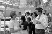 People conversing through sign language at the 1988 Florida Folk Festival - White Springs, Florida