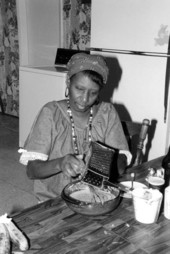 Liliane N. Louis making beignets - Miami, Florida.