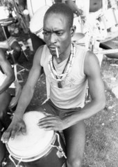 Drummer for Haitian Rara band Konbo Guinyn performs with group - Miami, Florida.