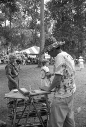 Jim Brock demonstrating bamboo flute making at the 1991 Florida Folk Festival - White Springs, Florida