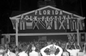 The Georgia Sea Island Singers lead the crowd in a song at the 1991 Florida Folk Festival - White Springs, Florida.