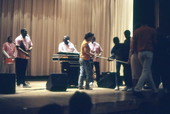 Key West Island Junkanoos performing for high school audience - Williston, Florida