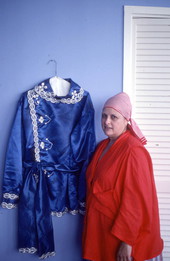 Carmen Pla showing men's Santeria shirt she made - Miami Beach, Florida.