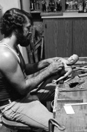 Jose Orta carving a santo - Miami, Florida