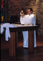 Priest holding a Quinceanera mass - Apopka, Florida