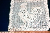 Irish Crochet of rooster .