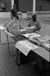 Vendor selling t-shirts and sunglasses in FSU's student union - Tallahassee, Florida.