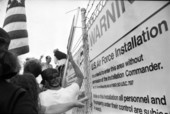 Protestors and signs at the air force base- Cape Canaveral, Florida.