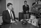 Atlanta Braves baseball player signing autographs for children - Tallahassee, Florida.