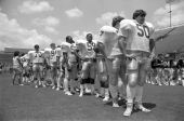 Members of the FSU football team including Don Desneso # 50, Sammie Smith # 33 and Roger Agne #70 - Tallahassee, Florida.