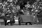 Cameraman and "Tommy Hawk" on the sidelines - Tallahassee, Florida.