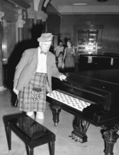 Somerled MacMillan examining Janko piano at the Stephen Foster Memorial Center - White Springs, Florida