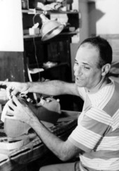 Violin maker Gino Cavaceppi at work in his shop- Alachua, Florida
