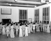 View showing servicemen in the "Grand march" with women at the Gainesville Recreation Department's Service Center.