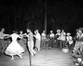 Square dancers accompanied by the Bell F.F.A. string band at the Florida Folk Festival- White Springs, Florida