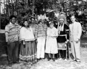 Group portrait of Seminole Indians, Creek Indians, and Dr. Alton Morris at the 1954 Florida Folk Festival - White Springs, Florida