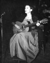 Ruth Neal, of Gainesville, playing guitar at the Florida Folk Festival- White Springs, Florida