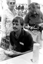 Wood-carver Donny Tolson at work at the Festival of American Folklife- Washington, D.C.