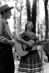 Herta Marshall plays the guitar and sings while husband David Marshall accompanies- White Springs, Florida
