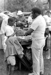 People enjoying steamed crabs at the 1985 Crescent City Catfish Festival - Crescent City, Florida