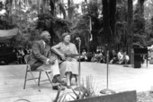 Winnifred Moon plays the guitar and sings while husband Colonel Jacob R. Moon accompanies- White Springs, Florida