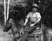 Park ranger patrolling on horseback at Lake Kissimmee State Park - Polk County, Florida