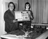Eighth grader Barry Brooks with his Social Studies Fair exhibit on the Battle of Natural Bridge
