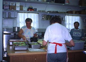 View showing women at a Masaryktown church preparing Czech and Slovak food for an upcoming festival.