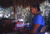 Seminole Indian woman making crafts at the Big Cypress Seminole Indian Reservation.