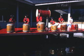 View showing a Japanese taiko drum ensemble during a practice session at the Ran-Getsu restaurant in Orlando, Florida.