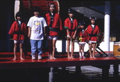 Group portrait of Japanese taiko drum ensemble during a practice session at the Ran-Getsu restaurant in Orlando, Florida.