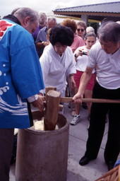 Rice being pounded with wooden mallets to make mochi rice cakes during a festival at the Morikami Museum in Delray Beach, Florida.