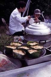 View showing food at the Wat Buddharangsi temple during festival - Miami, Florida.