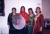 Iranian American women wearing traditional dress and holding a Daf percussion instrument in Clearwater, Florida.