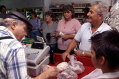 Customers and butchers at Acropolis Meat Market - Tarpon Springs, Florida.