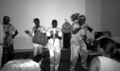 View showing the Bahamas Junkanoo Revue during a performance at the Historical Museum of Southern Florida's Caribbean Percussion Festival in Miami, Florida.