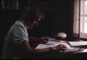 Folklorist Nancy Nusz working at her desk at the Florida Folklife Archive- White Springs, Florida