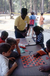 Children play board games at Florida Folklife Festival - White Springs, Florida.