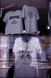 T-shirts in a tourist shop window - Tarpon Springs, Florida.