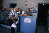 Customer and employee at National Bakery - Tarpon Springs, Florida.