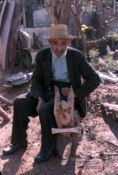 Sculptor Jesse J. Aaron with one of his wood sculptures - Gainesville, Florida.