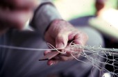 Valley Hill making a cast net