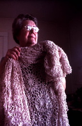 Mildred Rivers holding up an example of her tatting- Lake Butler, Florida