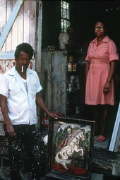 Pharaoh Baker with his painting "Death" - Lake City, Florida