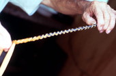 Claude Sheppard braiding a whip - Gainesville, Florida.