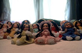Dolls with crocheted outfits