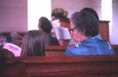 Grandmother and child in attendance at the Bethlehem Primitive Baptist Church - Old Chicora, Florida